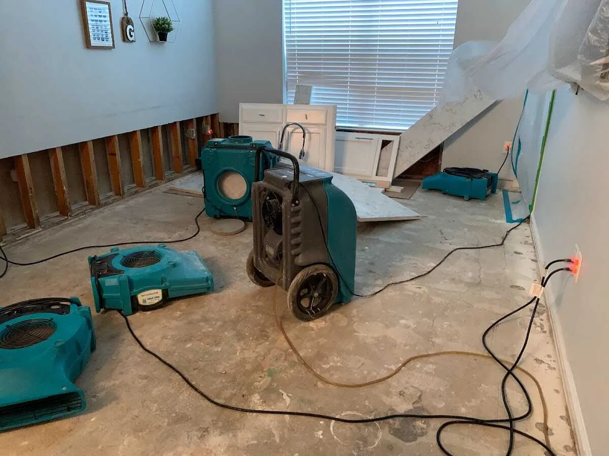 Dehumidifier in flood-cut room for Water Damage Restoration in Bolivar